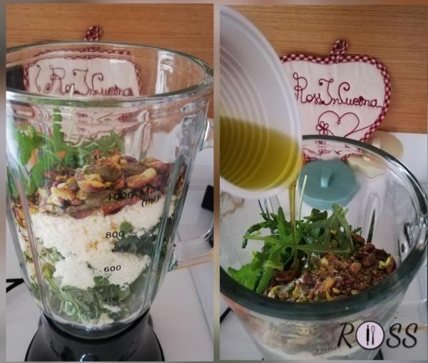 Prima di tutto, munitevi di un frullatore o mixer.
Inseritevi la rucola, parmigiano, pistacchi, pepe nero, acqua e l'olio. Chiudete il vostro frullatore ed azionatelo.
Se il pesto necessita di altro liquido, aggiungete un altro po’ di acqua.
